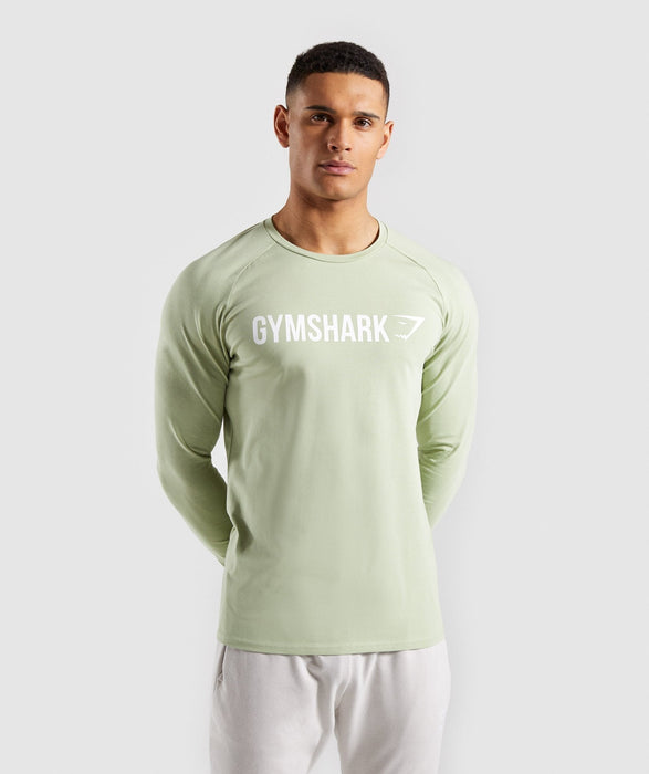 Gymshark Apollo Long Sleeve T-Shirt - GreenThe Apollo T-Shirt. We made it for the Gymshark Expo World Tour. It was so good we brought it back.- Relaxed fit- Long raglan sleeves- Classic Gymshark chest logo- 9mens teeoverrask.noOverrask.nonull