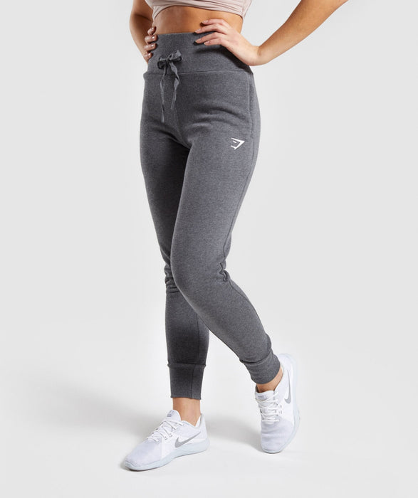 Gymshark High Waisted Joggers - Charcoal MarlConsistently comfy and effortlessly cool.- High-waisted fit- Adjustable waistband and cuffed ankles- Zip pockets- Printed Gymshark logo- 80% Cotton, 20% Polyester- Mtights & leggingsoverrask.noOverrask.nonull