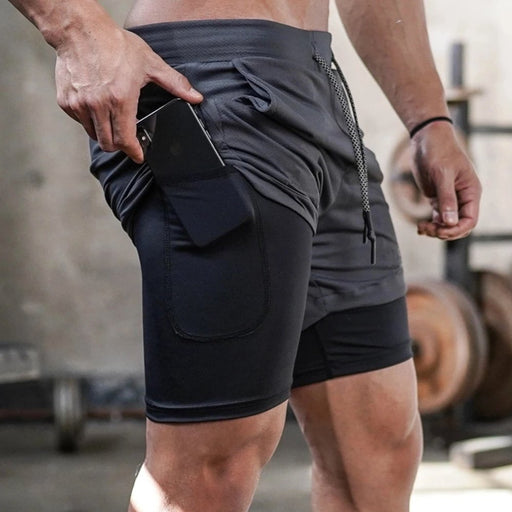Gym shorts med Compression under tights og sidelomme - Overrask.no