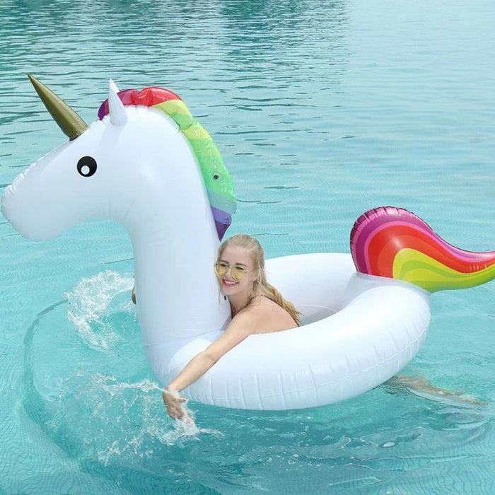 Inflatable unicorn swimming ring - Overrask.no